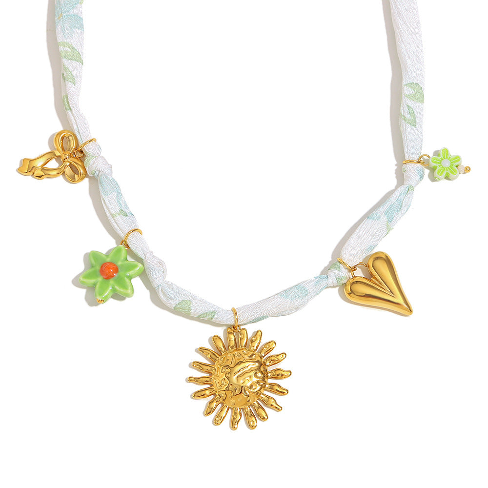 Edgy Ribbon Sun Pendant Necklace – 18K Gold Plated Stainless Steel Trendy Boutique Jewelry for Women